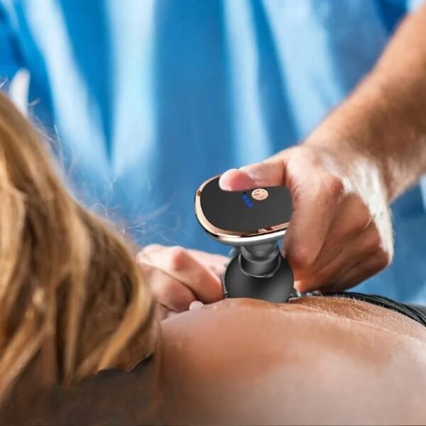 Woman experiences ultimate relief with our mini USB massage gun.