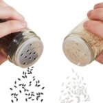 Rotating spice rack with 20 shaker jars for convenient and quick seasoning.