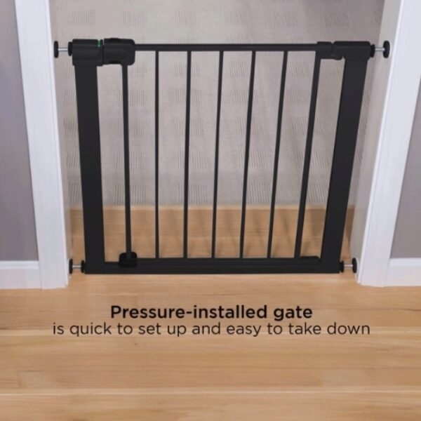 Safety 1st child gate, pressure-installed for quick setup and easy removal.