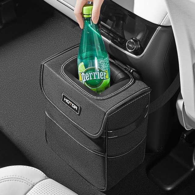 HOTOR car trash can holds plenty of bottles, securely fixed to the console.