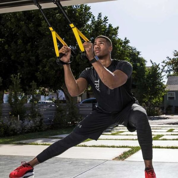 Fitness Athlete Using Suspension Trainer Straps