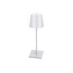 White bedside table lamp with rechargeable design and sleek style.