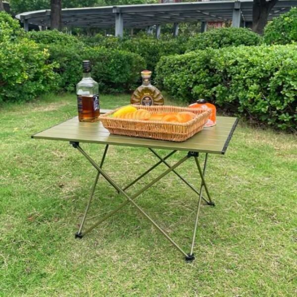 Foldable picnic table with drinks and snacks outdoors