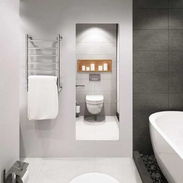 Stick-on plexi mirror in bathroom with crystal-clear view.