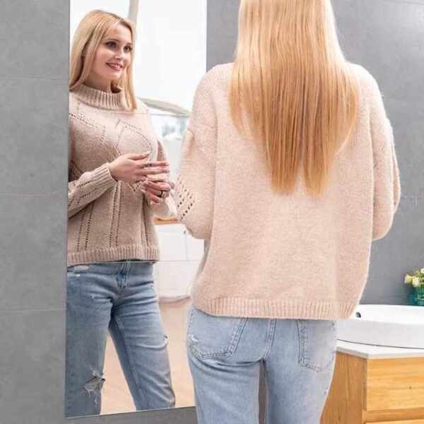 Woman using stick-on plexi mirror with clear view.