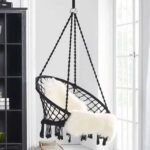 Black indoor swing hammock chair with breathable mesh.