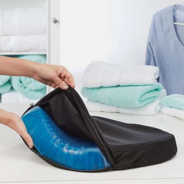 Woman placing egg sitter seat cushion in cover.