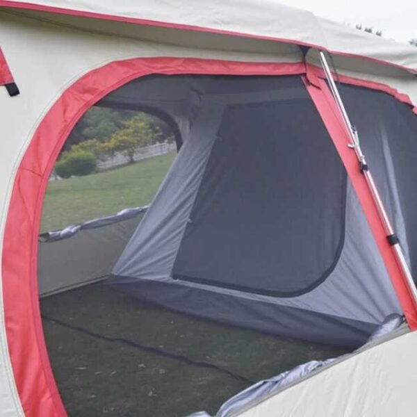 Close look at the interior of family camping tent with two living rooms and one bedroom.