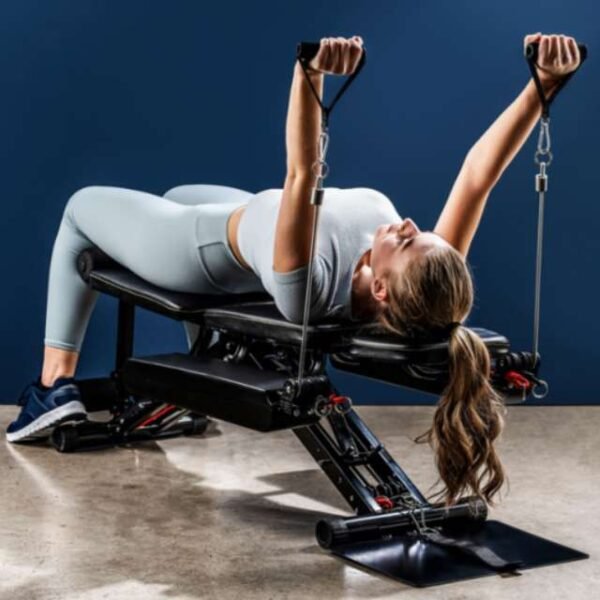 kraftstation 40-in-1 home gym chest exercises woman