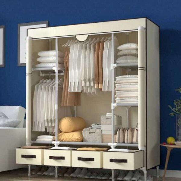 Large clothes wardrobe in beige placed in a bedroom.