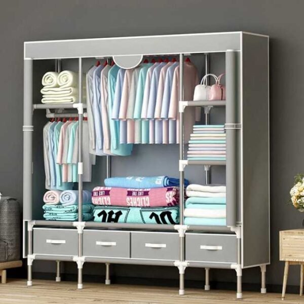 Large clothes closet in grey placed in living room and holding shirts, towels, and blankets securely.