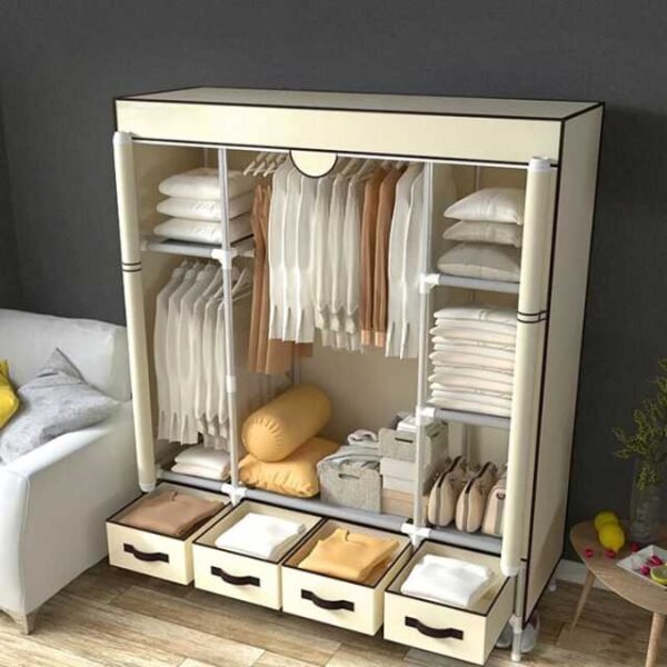 Large clothes wardrobe with four storage drawers for keeping clothes organized.