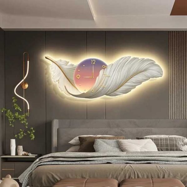 Lovely white modern feather wall clock on living room wall.