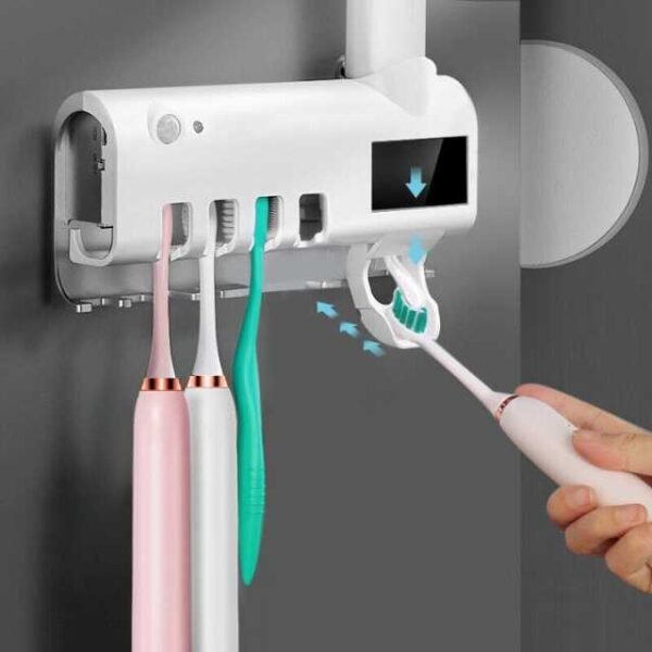 UV toothbrush sterilizer with automatic toothpaste dispenser.