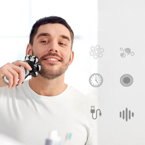 Man enjoying the ergonomic design of the bald head shaver while touching up beard.