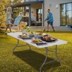 Family enjoying quality time in the garden with picnic table.