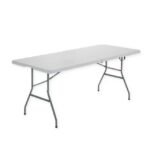 White folding picnic table with HDPE tabletop and steel legs.