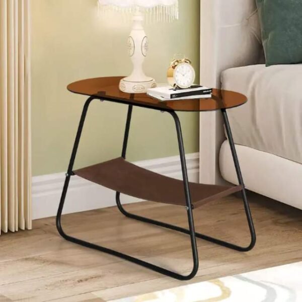 Metal coffee table that can be used as a nightstand or plant holder.