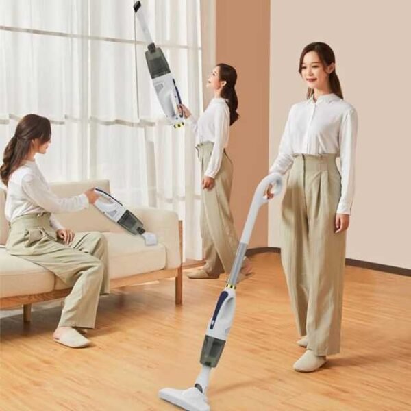 Woman using multifunctional stick vacuum cleaner to clean hard floors, high walls, and couch.