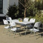 Large outdoor table in the garden accommodates up to 8 people.