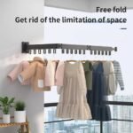 Space-saving small clothes hanger mounted on wall, freeing up floor space.