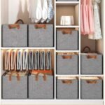 Clothes organizer boxes stacked inside a wardrobe.