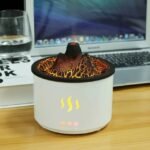 Volcano oil diffuser in workplace emitting mist to relieve stress.