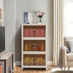 3-Tier storage cabinet in living room corner with decorative items and snacks.