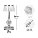Crystal table lamp with acrylic crystal lampshade in a compact design.