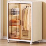 Foldable clothes wardrobe with wheels in cream white.