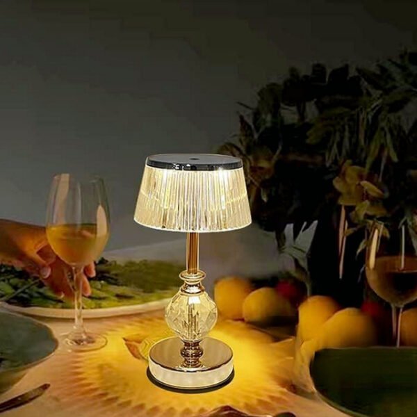 Golden crystal table lamp on a counter with rechargeable and cordless design