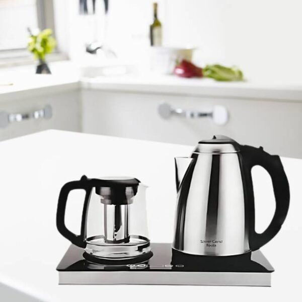 Silvercrest digital kettle with glass teapot on digital control panel.