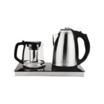 Silvercrest digital kettle beside glass teapot on kitchen counter.