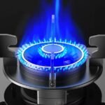 Close-up of durable burner on fire for even heat distribution and easy cooking.