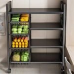Heavy-duty iron mobile storage trolley with adjustable wired baskets for fruits and vegetables.