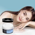 Woman with clear skin after using COSRX hyaluronic acid cream for bright, hydrated skin.