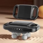 Handheld massage gun in black with sleek design, 4 heads, and digital control panel.