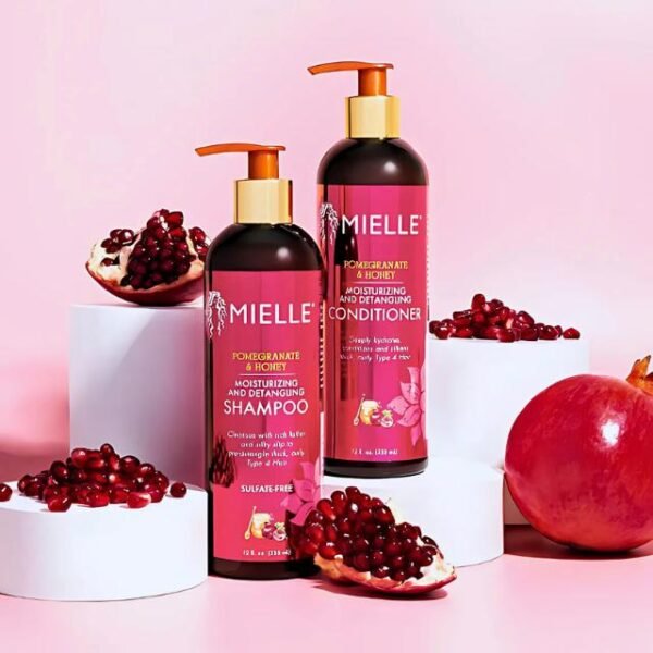 Mielle moisturizing and detangling shampoo with pomegranate and honey extracts.