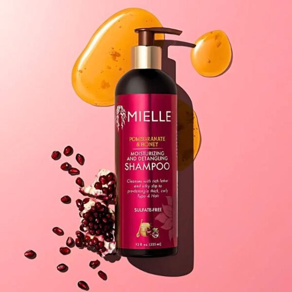 Mielle pomegranate and honey shampoo for smooth cleansing of curly hair.