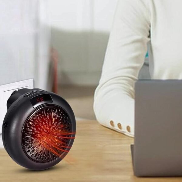 Plug-in space heater ideal for offices or workspaces to maintain cozy temperatures.