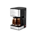 Lexical drip coffee maker in silver and black brewing coffee on white background.