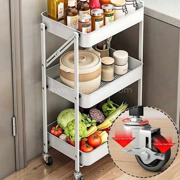 A kitchen cart with three tiers holding jars, containers, and vegetables, featuring close-up of locking wheel for added stability.