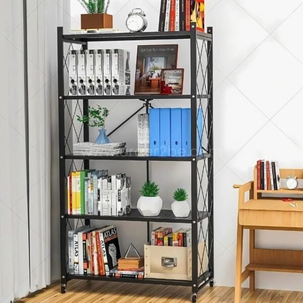 Black metal 5-tier bookshelf with books, plants, and decorative items in a home office.