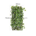 Folded garden fence with green leaves, shown in compact dimensions of 120 cm in height and 70 cm in width for easy storage.