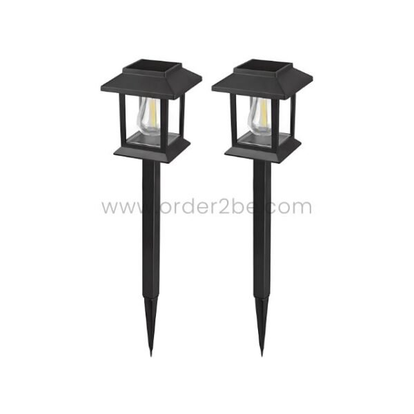 Two black solar garden pathway lights with lantern-style tops and clear panels, mounted on stakes for secure placement.