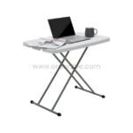 Folding coffee table set up as a workspace with a laptop, mug, and papers, ideal for remote work or studying in small spaces.
