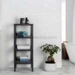 Black 4-shelf organizer stand in a bathroom corner with toiletries, towels, and a checkered storage box.