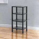 Black 4-shelf organizer stand with slatted shelves against a light gray wall and wood flooring.