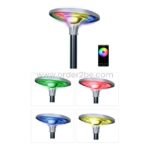 Circular LED smart lamp displaying green, red, blue, and yellow colors, controlled via smartphone app.