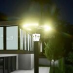 Minimalist street lamp emitting warm light in front of a contemporary building, enhancing safety and aesthetics.